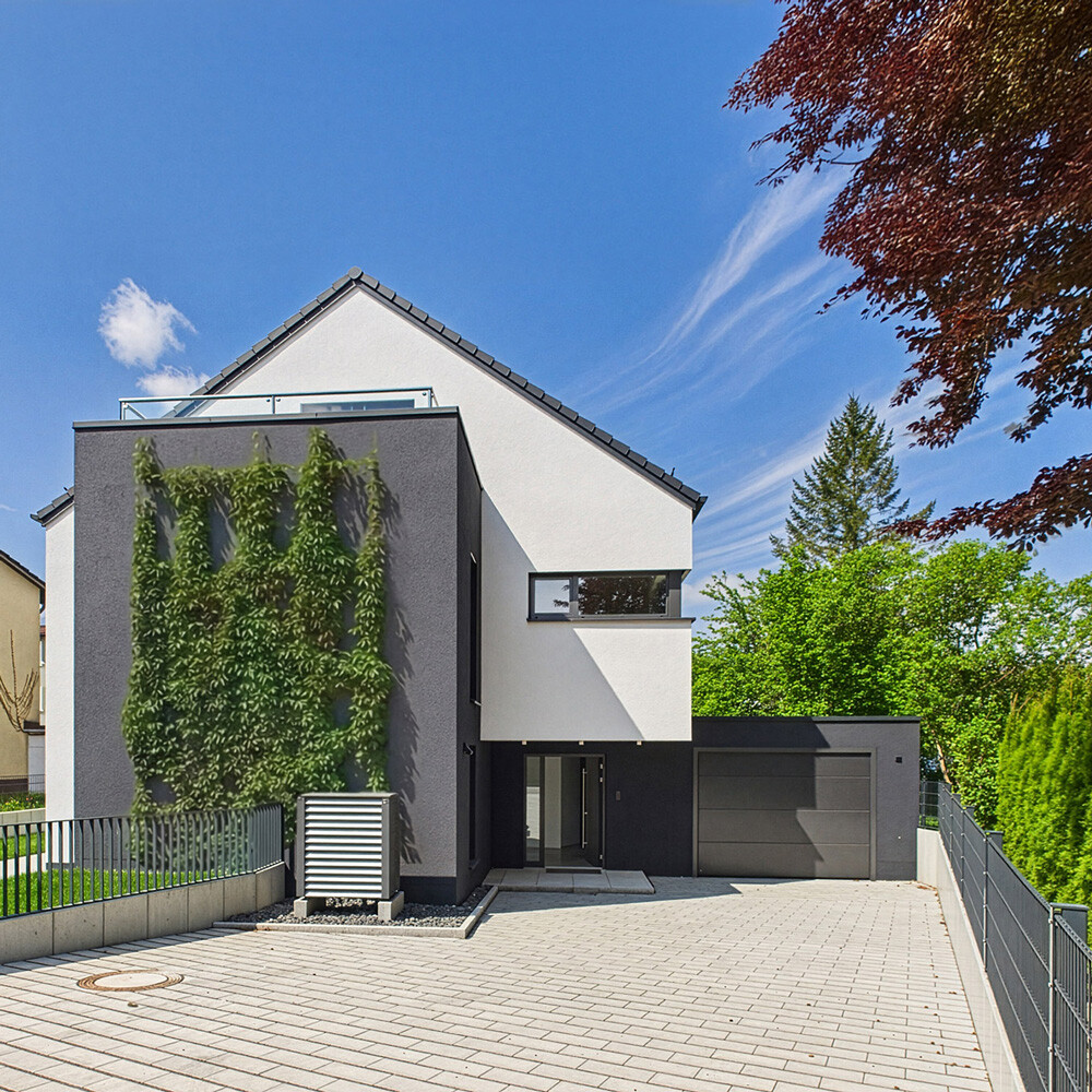 Moderne Neubau Immobilie mit Garage und grosser Einfahrt