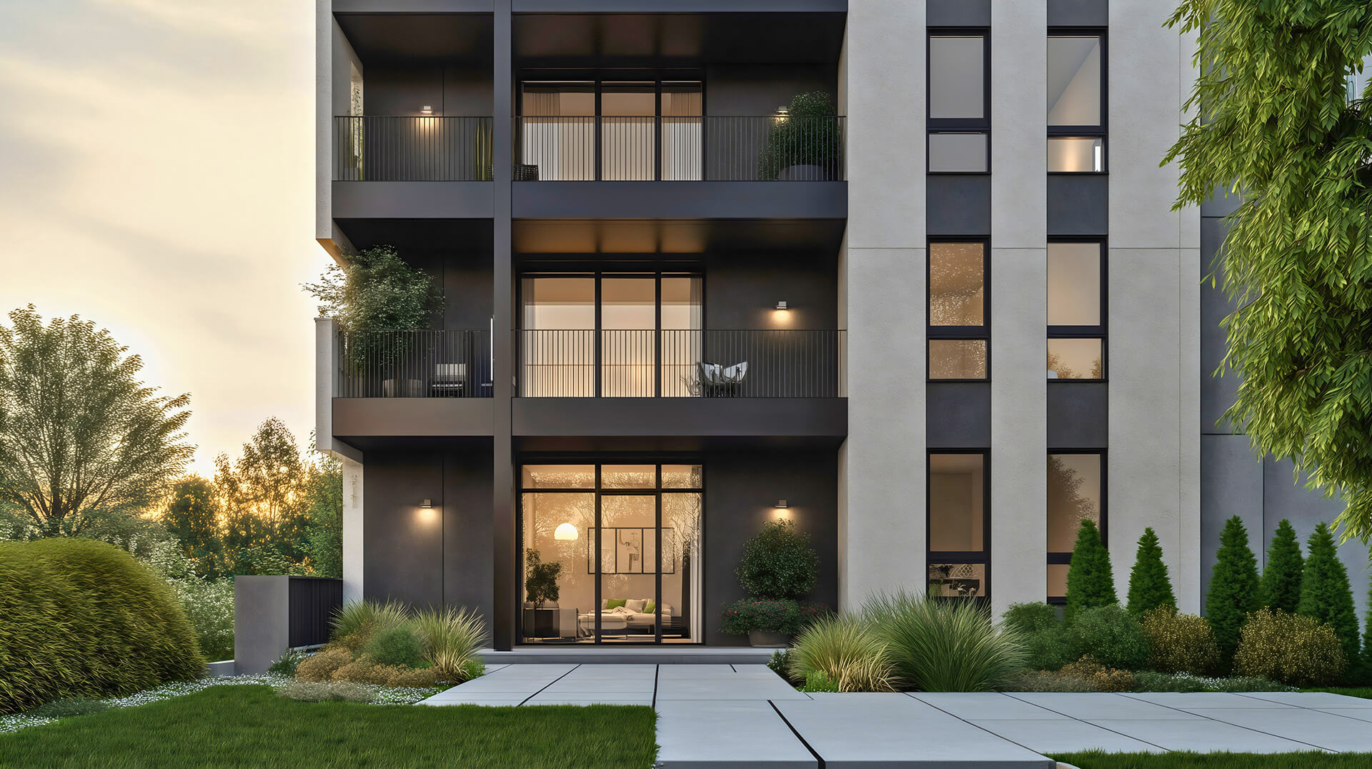 Mehrfamilienhaus mit Balkonen, großen Fenstern und Grünanlagen