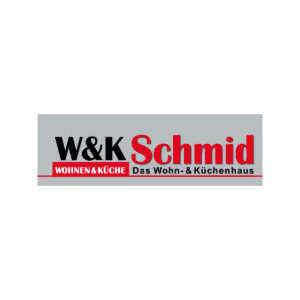 W&K Schmid Logo mit WOHNEN & KÜCHE auf grauem Hintergrund.