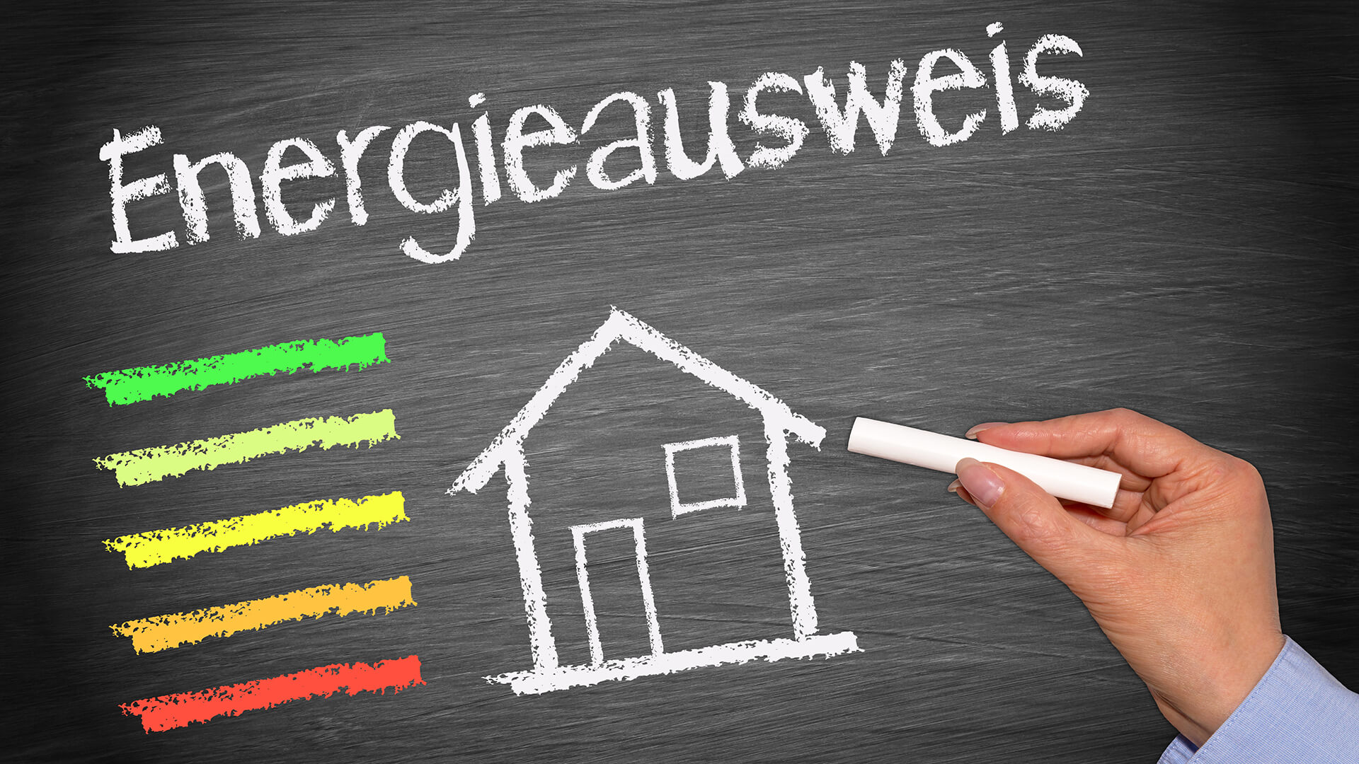Haus und Energiebalken auf Tafel, Schrift: Energieausweis.