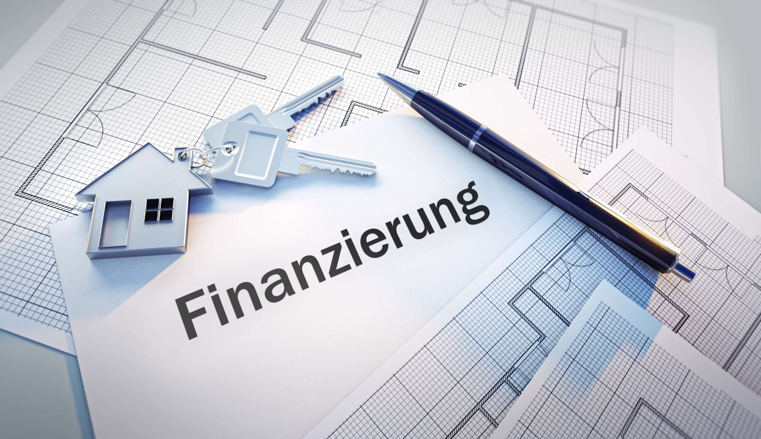 Papier "Finanzierung", Schlüsselbund, Stift, Baupläne.