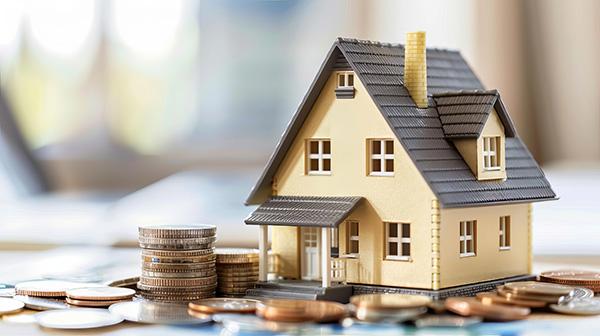 Hausmodell auf Münzen