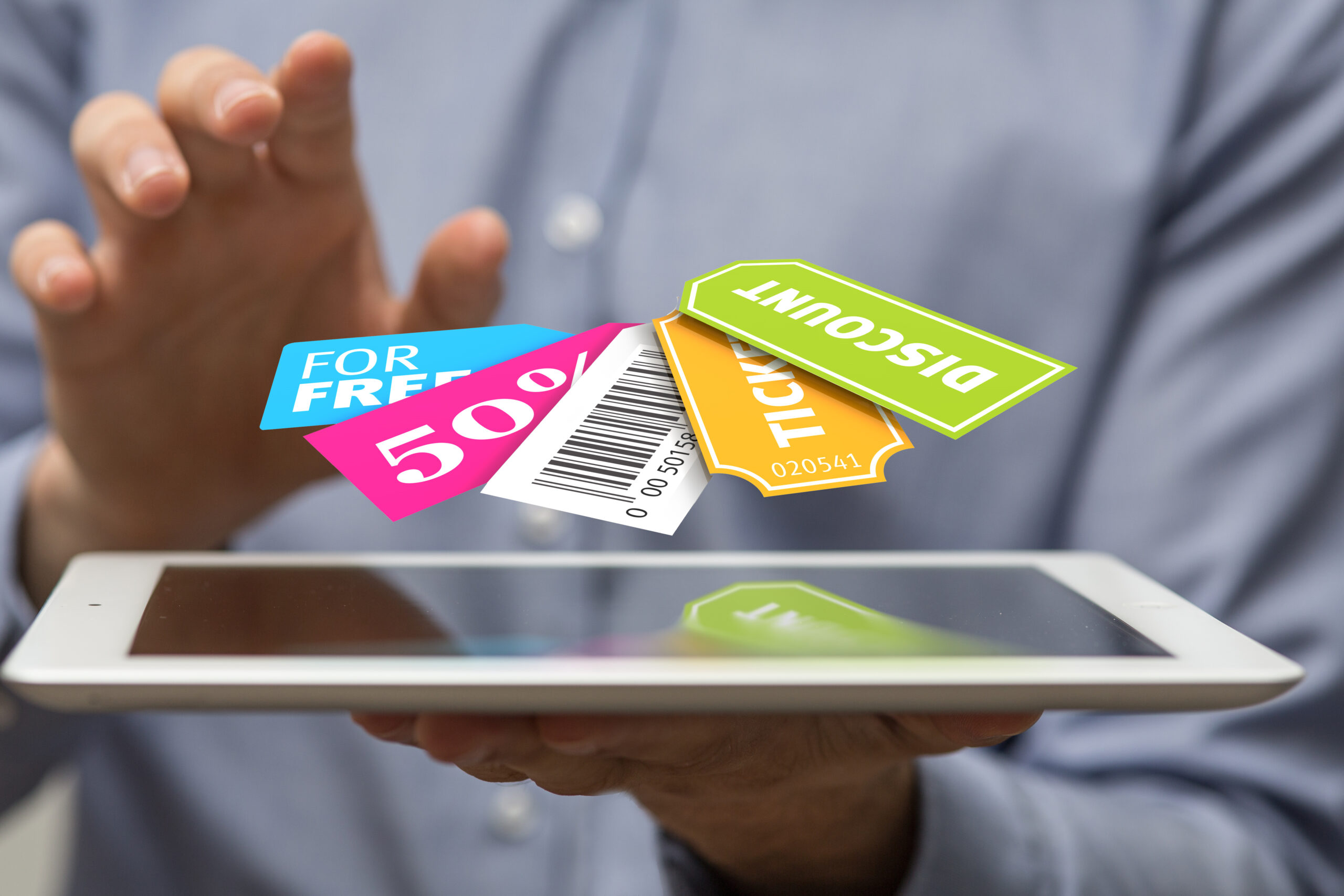 Coupons fliegen über Tablet