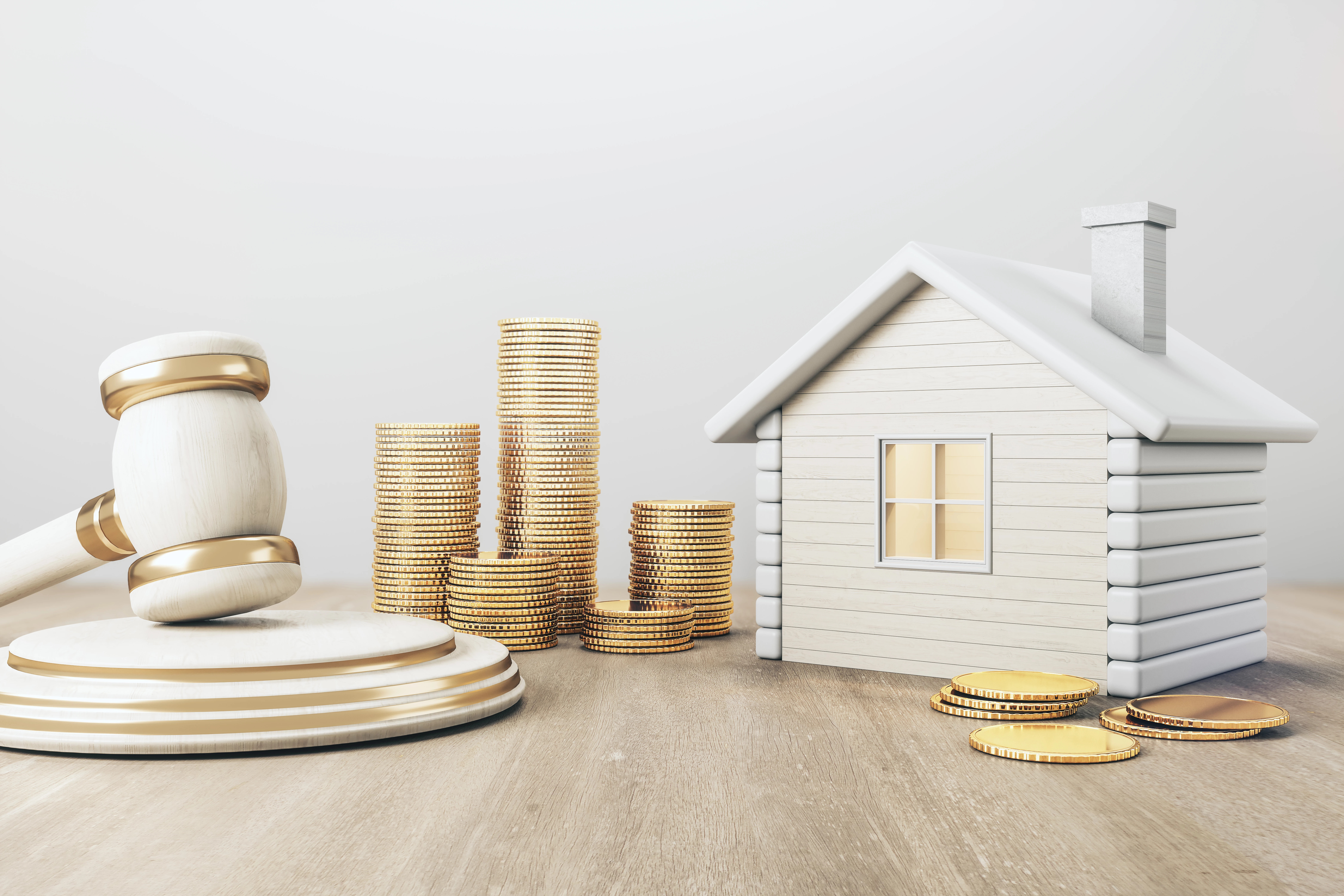 Modellhaus und Auktionshammer