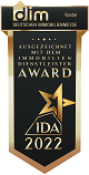 Gold-schwarzes Abzeichen: Immobilien Dienstleister Award 2022.
