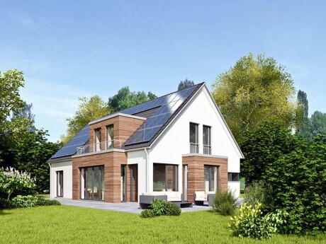 Ein freistehendes Einfamilienhaus mit Solarpanelen