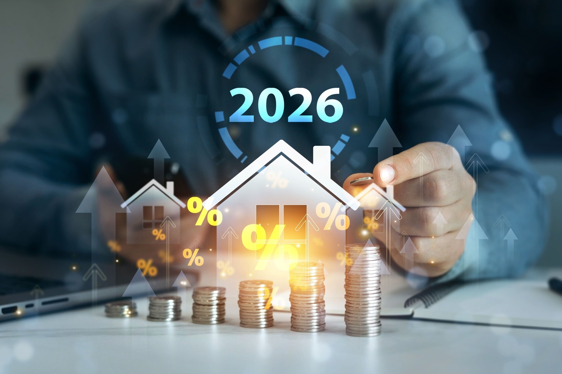 Münzen werden neben Haus-Icon, 2026 und % gestapelt.