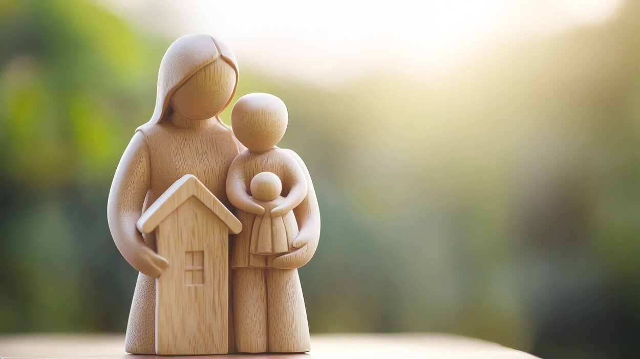 Miniaturfiguren mit Haus