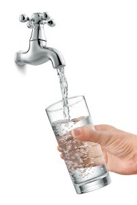filling a glass of water from tap